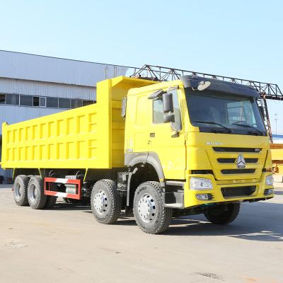 China used sinotruk howo 8x4 heavy duty truck tipper truck prices > 8L for sale