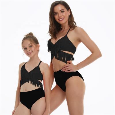 China 2021 new parent-child swimwear halter removable padded black neck fringed cross waist bikini top strap halter swimwear for sale