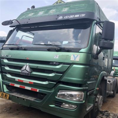 China Secondhand High quality sinotruck howo 6x4 /8x4 tippers/control left hand drive used tractor head truck In africa for sale