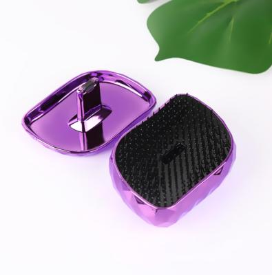 China Comfortable Creative Diamond Massage Comb Travel Equipment Anti-static Magic Comb Hairdressing Tools for sale