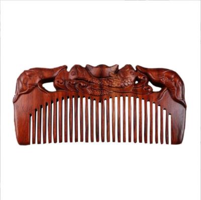 China Comfortable Carved Sandalwood Comb Massage Comb Hand-Polished Sandalwood Comb Custom Logo for sale