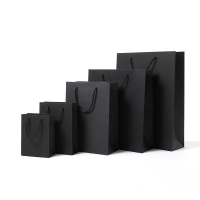 China Recyclable Wholesale Custom Printed Black Luxury Shopping Paper Gift Bag With Multiple Handles Optional for sale