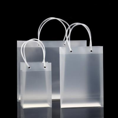 China Custom Wholesale Recyclable PVC Shopping Handbags Bags Tote Shopper Handles Transparent Clear Large Capacity for sale