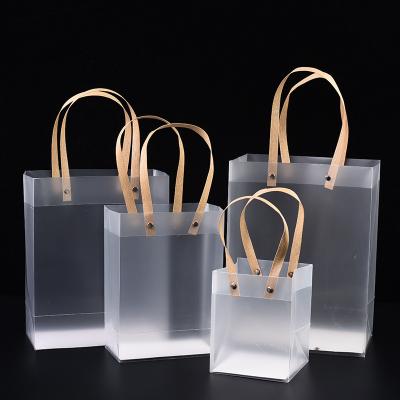 China Wholesale Custom Recyclable LOGO Plastic Transparent Recyclable Shopping PP Tote Bag PVC Handle Gift Eco-friendly Paper Bag for sale