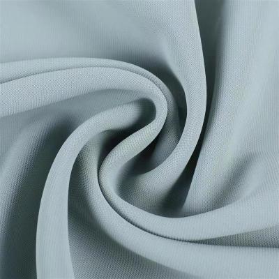 China Wholesale Memory HuaZu Textile Polyester Spandex 2055# Dyed Fabric Woven Twill For Wind Coat Suits for sale