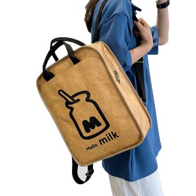 China Brown Vintage Portable Paper Travel Student School Backpack Custom Satchel Mochila Simple Casual Teenager Kraft Paper School Bag for sale