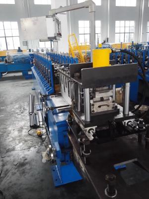 China 142mm rolling shutters door forming machine with 5-15m/min speed PLC control,include punching for sale