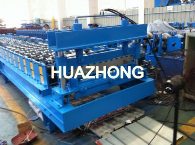 China High Speed 0.5-0.8mm Roof Panel Roll Forming Machine 609mm Coil Width With Hydraulic Cutting for sale