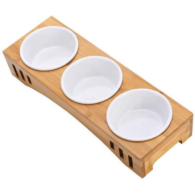 China Viable Raised Dog Cat Stand Feeder by Cat Bowls Raised Pet Dog Feeder with 3 Ceramic Bowls for sale