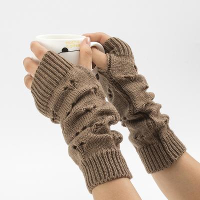 China Women Plain Stylish Gloves Hand Warmer Winter Gloves Arm For Crocheting Heart Hollow Mitten Warm Fingerless Knitting Gloves for sale