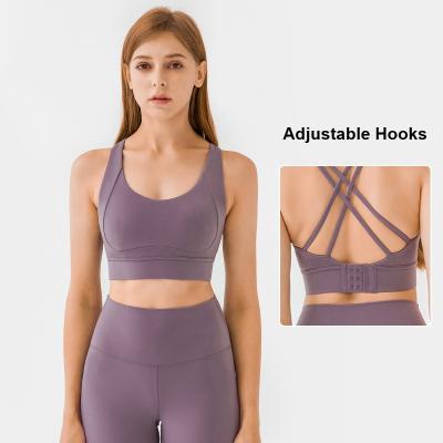 China Women's Breathable Sportswear 3 Rows Buckles Adjustable Back Strappy Cross Back Lift Up Gather Yoga Sports Bra for sale