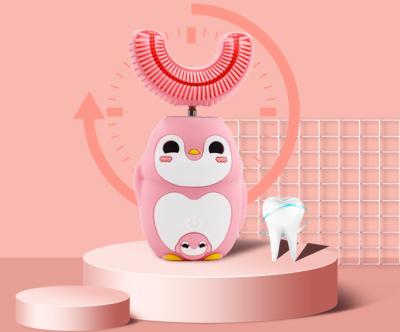 China 360 Degree Automatic Toothbrush Battery Operated IPX7 Electric Wireless Waterproof Mini Electric Toothbrush Kids Penguin Oral Cleaning Dental for sale