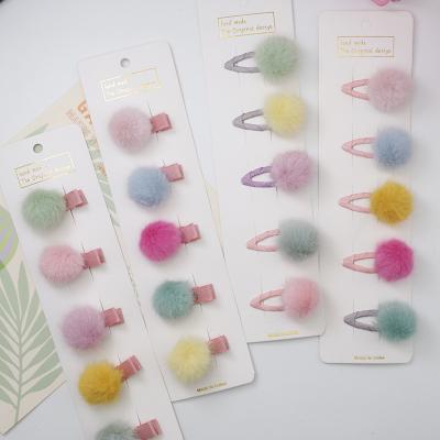 China Hot sale fashion winter kid's hair accessories colorful cute pom pom hair cut lovely plush hairpins snap clips for little girls for sale