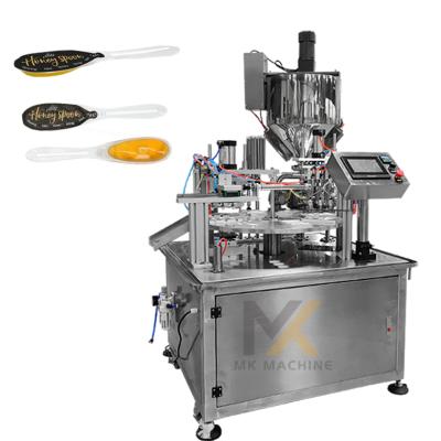 China Hot Sales 3 Food Nozzles Tea Sweetener Honey Plastic Spoon Filling Packaing Machine for sale