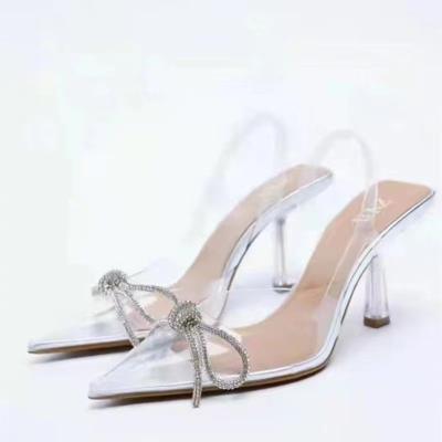 China 2022 hot new light weight European style transparent with pointed pressure drill bow PVC party decorative ladies heels for sale