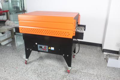 China Model no BS-4525 Shrink Tunnel  packaging machine, Steel of material,Orange with Black color Tunnel  size 450x(50-250)mm for sale