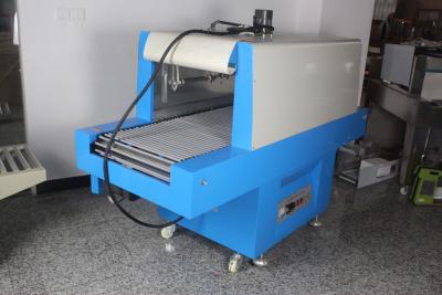 China Model no BS-550 Shrink  packaging machine, Steel of material,Blue with White color Tunnel  size 550x350mm for sale