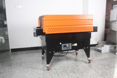 China Model no BS-4535 Shrink  packaging machine, Steel of material,Orange with Black color Tunnel  size 450x(50-350)mm for sale