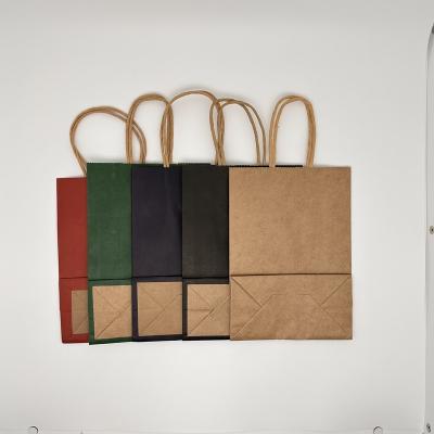 China Handmade Custom Kraft Paper Shopping Making Flat Bottom Handle Custom Printing Fancy Paper Bag for sale