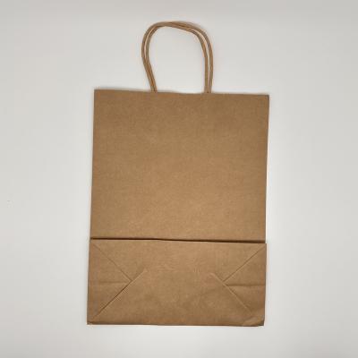 China Fancy Handmade Customized Paper Handle Kraft Paper Bag With Custom Logo for sale