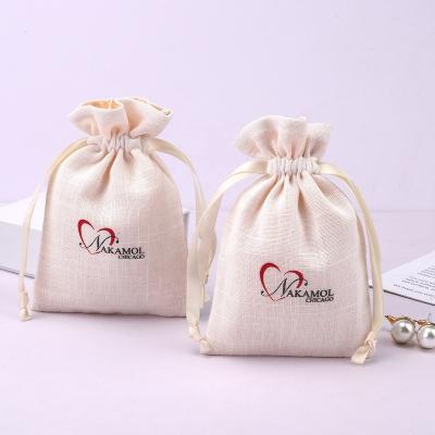 China 100% Natural High Quality Canvas Fabric Drawstring Bag Wedding Favor Gift Jewelry Necklace Bracelet Cotton Jewelry Pouch for sale