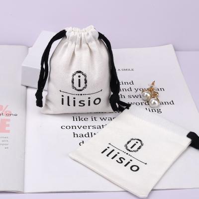 China Luxury Custom White Soft Drawstring Bag Cotton Makeup Pouch Safety Logo Printed Canvas Cosmetic Gift for sale