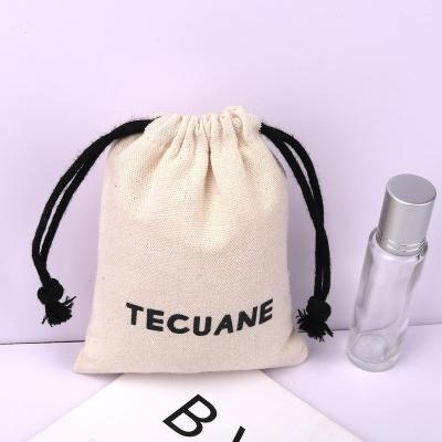 China Recyclable 8Oz Canvas Eco-Friendly Skin Care Cosmetic Drawstring Bag Logo Natural Makeup Canvas Pouch Custom Made for sale