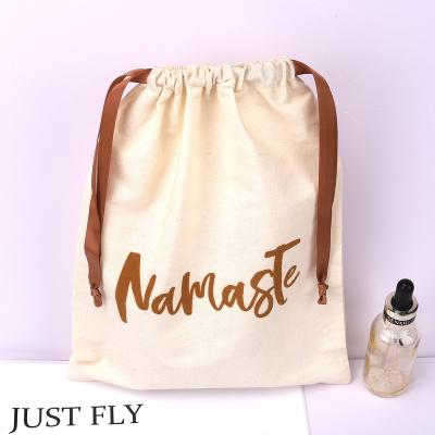 China High Quality Beige Drawstring Cotton Cloth Gift Building Block Storage Pouch Muslin Dust Bag With Logo for sale