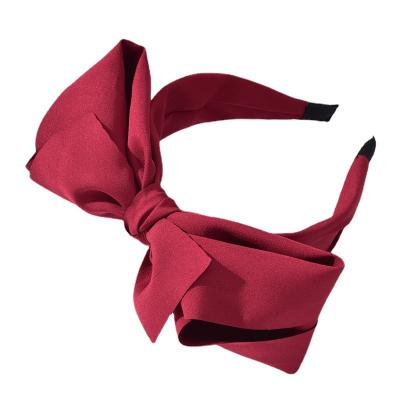 China Fashionable Lady's Large Knot Bow Solid Color England Style Hairbands Cloth Bow Knot Headbands For Women for sale