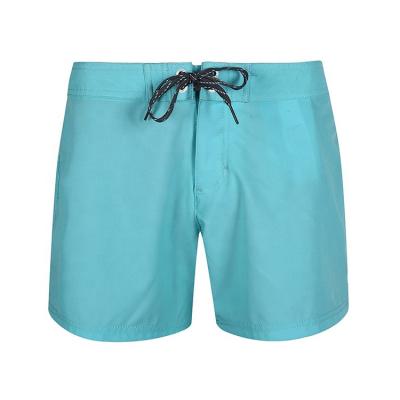 China Custom Made Mens Summer Anti-UV Solid Green Boys Shorts Seamless Boardshorts for sale