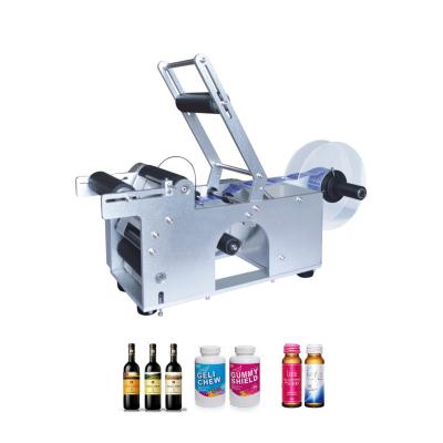 China Semi Automatic Food Desktop Round Plastic Bottle Cans High Precision Sticker Labeler Machine for sale