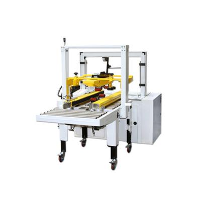 China Chemical Semi Automatic Top And Bottom Drive Belt Adhesive Tape Sealer Crate Box Carton Sealing Machine for sale