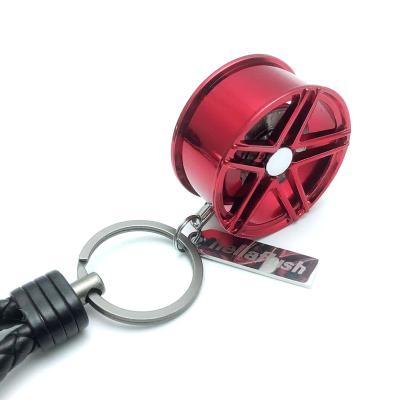 China Art Creative Car Metal Keychain Turbo Gear Hub Gear Folk Disc Pendant Shock Key Chain for sale