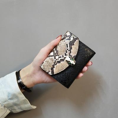 China Factory Price RFID Ladies Pinch Python Pattern Frame Clutch RFID Wristband Blocking PU Leather Women Short Wallet For Women for sale