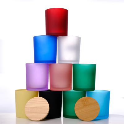 China Home Decoration wholesale custom lid candle vessels 14oz 12oz red blue green frosted empty glass candle cup for sale