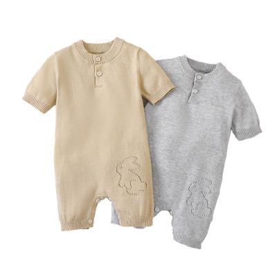 China Cute Newborn Baby Boy Girl Solid Romper Button Infant Short Sleeve Overalls Knit Cotton Outfits Clothes for sale