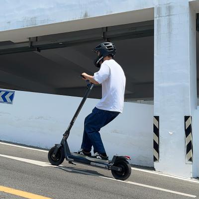 China 2000W Unisex Powerful Adult Electric Scooter Best Lightweight Electric Scooter With 10 Inch*60mm Tubeless Tires for sale