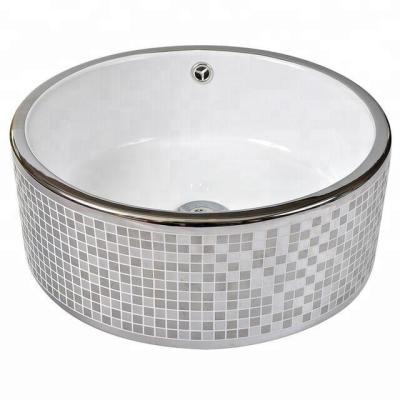 China Luxury Silver Mosaic Bathroom Vanity UAE Wash Basin No Hole Ceramic Sink Faucet Hole Steel Color for sale