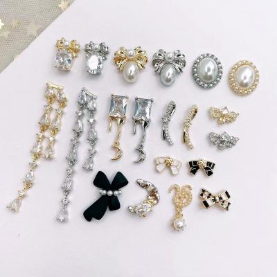 China Shiny Crystal White Rhinestone Rhinestones Art Decoration Mix Shape Fancy Nail Metal Nail ab for sale