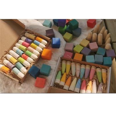 China 100% Eco-Friendly Wooden Montessori Toys Rainbows Pull Palos Sticks Brot with Small Eyes Peg Dolls Pastel Cubes for Kids Open Play for sale