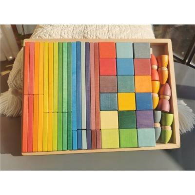 China 100% Eco-Friendly Large Rainbow Wooden Slats Building Blocks Stacking Cubes Pieces with Peg Doll for Early Learner Kids for sale