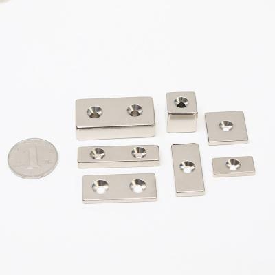 China Industrial Magnet Cylinder Permanent Magnet With Hole Powerful Magnets With Two Holes NdFeB Countersunk Industrial Magnet for sale