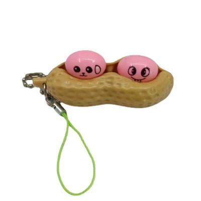 China Eco-friendly Decompression Silicone Trigger Squeezed Bean Peanut Toy Magic Bean Decompression Key Chain For Kids And Adults for sale