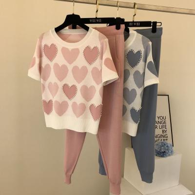 China Breathable Summer Korean Love Printed Knitted 2 Piece Set Women Short Sleeve Beading Sweater Tops+Capris Pants Suit Pink Casual Tracksuit for sale