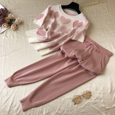 China Summer Breathable Suit Ladies Two Piece Knitted Casual Short Sleeve Pants Printed Love Heart Beaded Sweater + Double Pocket Pants Suit for sale