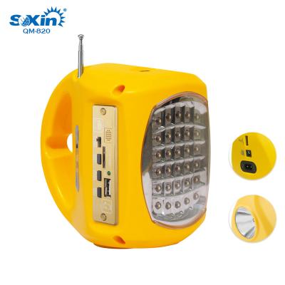 China Warehouse multifunctional solar led rechargeable search light with fm radio mp3 emergency light lantern for sale