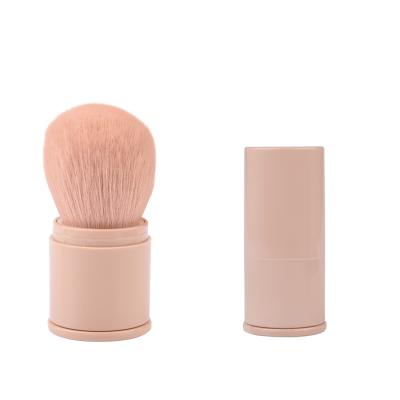 China Portable Pink Retractable Makeup Powder Brush Portable Travel Face Powder Soft Makeup Brush for sale