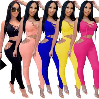 China Two Piece Anti-Pilling Summer Outfits Sets Sleeveless Hollow Bandage Crop Top Pants 2 Piece Womens Set Solid Bodycon 2 Piece Pants Sets for sale