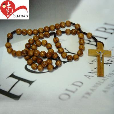 China Pray or Religious Gifts Catholic Religious Gift Wholesale Olive Wood Crucifix Necklace Prayer Beads for sale