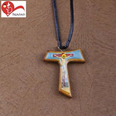 China Jesus Crucifix Religious Catholic Leather Wood Carving Necklace Wooden Variety Manufactures for sale